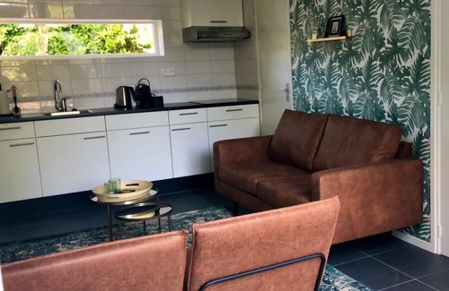 Bruinisse House | Nice, trendy furnished, vacation bungalow with fenced garden. Pets welcome!