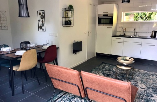 Bruinisse House | Nice, trendy furnished, vacation bungalow with fenced garden. Pets welcome!