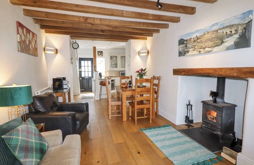 Llangollen Cottage | NO. 9 ON THE RIVERBANK, pet friendly, with open fire in Llangollen