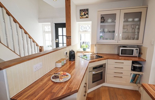 Llangollen Cottage | NO. 9 ON THE RIVERBANK, pet friendly, with open fire in Llangollen