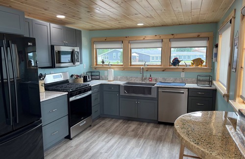Mannsville House | North Sandy Pond Lakehouse with dock and hot tub