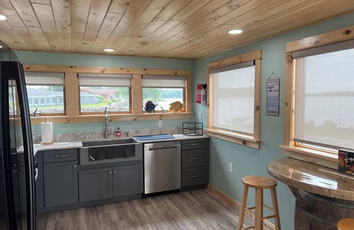 Mannsville House | North Sandy Pond Lakehouse with dock and hot tub