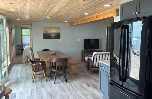 Mannsville House | North Sandy Pond Lakehouse with dock and hot tub