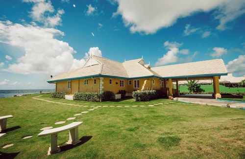 Lowlands Villa | Ocean front luxury villa in gated golf course community with private beach.