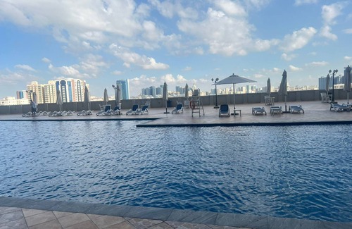 Rumailah Apartment | Ocean View Family friendly two bedroom apartment right opposite the Ajman Sea!