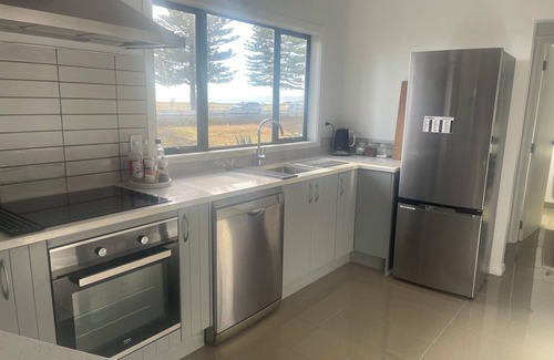 Napier House | Ocean views in large family home