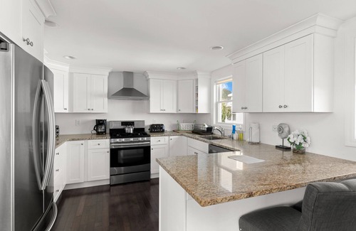 West Hampton Dunes House | Oceanview home with a washer/dryer, spacious deck, central AC, fireplace