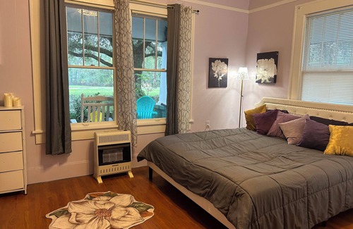 Saint Maurice Bed & Breakfast | Old farmhouse near Natchitoches. downstairs king bed shared bathroom