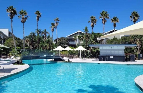 Magenta Shores House | On Par at Magenta - Resort pool and beach access