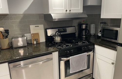 Mid-North District Apartment | One block from Lincoln Park and the zoo