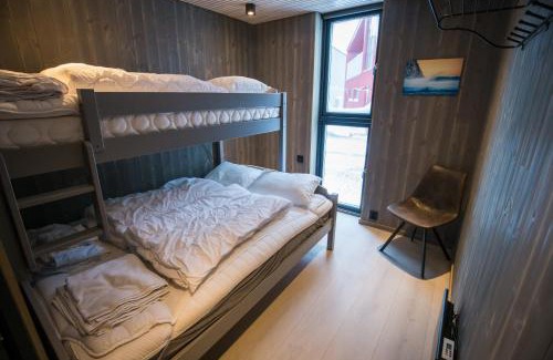 Henningsvaer Apartment | Opplev nordlyset og bo ved sjøkanten!
