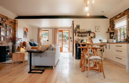 Riverside House | Outdoor Spa & Sauna with amazing views at Jaclyn Studio