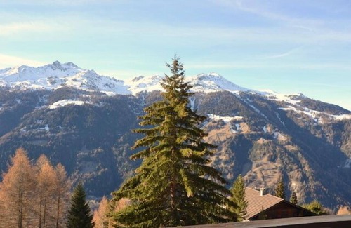 St. Luc Ski Chalet | Outside: three-storey chalet above Saint-Luc, for 7 persons, terrace and balcony with garden furnitu