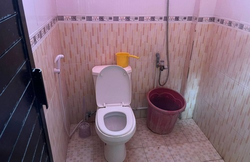Lamongan Hotel | OYO Life 93036 Eddy Homestay Syariah