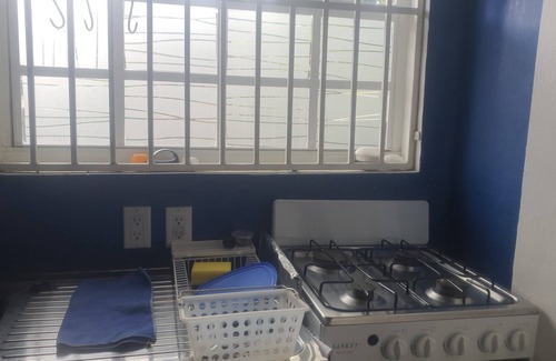 Marie Pampoen Apartment | PACCS APPT#1:Practical, Affordable, Clean, Central & Simple