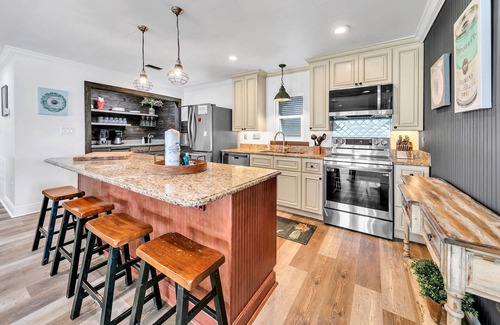 Holiday Isle House | Palm Breeze, boat dock and pool, pet friendly