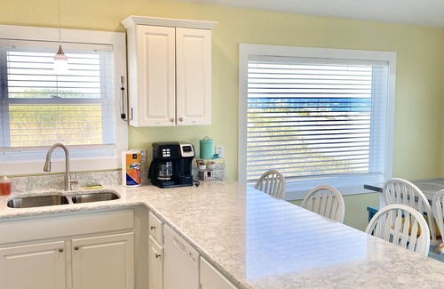 Sea Retreat House | Panoramic Ocean Views in this Updated Vintage Beach Box Right on the Beach!