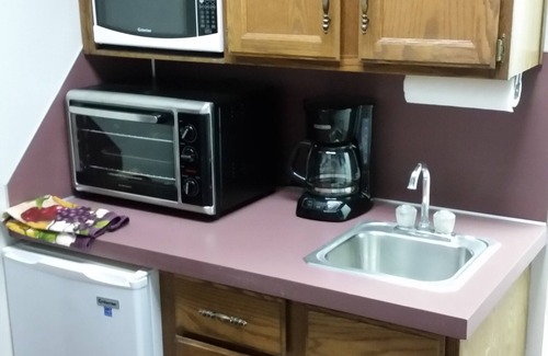 Norton Shores Apartment | Paradise Cove Lighthouse 2 br 1 bath on storage pond ~ sleeps 6