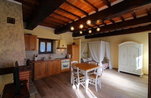 Castel Focognano Villa | Part of an old stone country house enjoying a splendid panoramic view over the woods of the Casentin