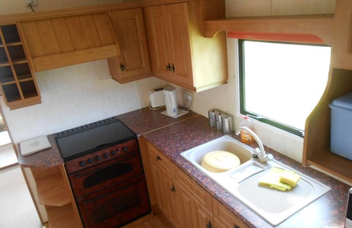 Callington House | Peaceful caravan with WiFi in charming outskirts Callington on a working farm .