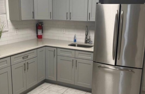 Roosevelt House | Peaceful Gathering Modern Kitchen & Living space