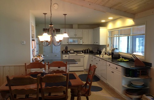 Brutus Cottage | Peaceful setting on northwest shore of Burt Lake - sleeps 12