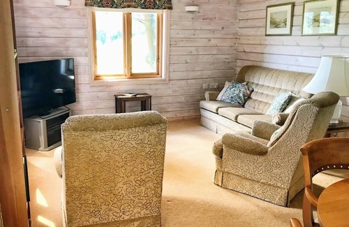 Llangeler Cabin | Peaceful Swedish Log Cabin set in a Vineyard Location