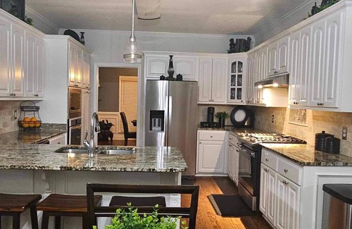Evans House | Perfect Masters Retreat. Cozy home featuring salt water pool on a secluded lot.