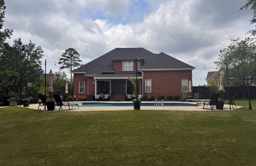Evans House | Perfect Masters Retreat. Cozy home featuring salt water pool on a secluded lot.