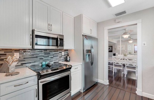 Deerfield Beach House | Pet friendly house with a heated pool and hot tub!