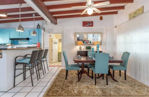 Savannah Beach Cottage | Pet Friendly, porch and short walk to beach