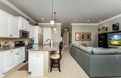 Villa Lago House | Pet Friendly ~ Water View ~ 2 Golf Carts ~ Community Pool