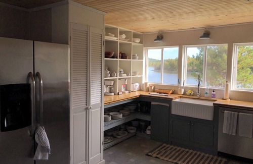 Calais House | Pet Friendly Waterfront Farmhouse- PVT OFC, Views, Kayaks, Game Room & Playset