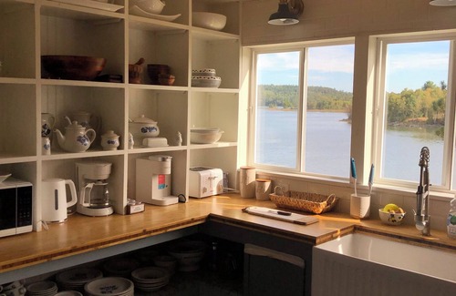 Calais House | Pet Friendly Waterfront Farmhouse- PVT OFC, Views, Kayaks, Game Room & Playset