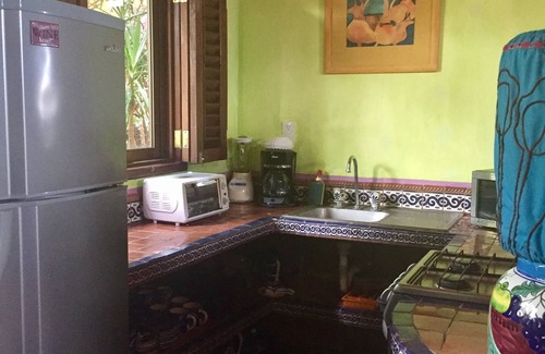 Los Ayala Apartment | Playa Suite: Beachfront Suite With Private Patio Set Amidst Tropical Gardens