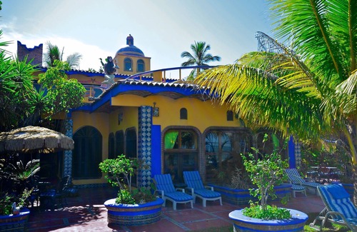Los Ayala Apartment | Playa Suite: Beachfront Suite With Private Patio Set Amidst Tropical Gardens