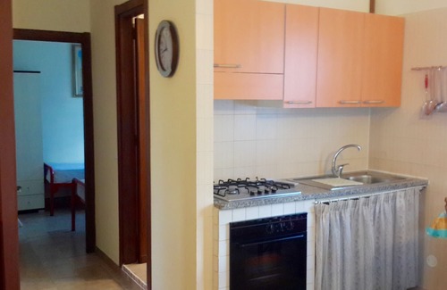 Alghero Villa | Podere le Bombarde, 150 meters from the sea, for 5 people, with garden and verandas