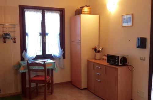 Alghero Villa | Podere le Bombarde, 150 meters from the sea, for 5 people, with garden and verandas