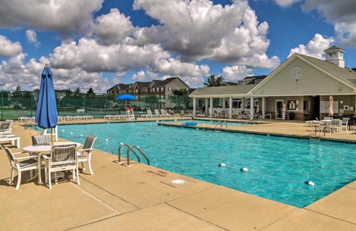 Villages of Five Points Apartment | Porch and Community Perks Walkable Lewes Condo