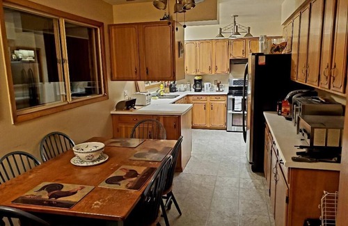 Kingston House | Prestigious residential family friendly home overlooking Golf Course!