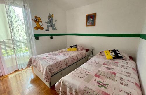 Pivka Apartment | Prijeten prostoren apartma v hiši