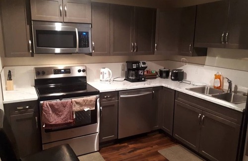 Timberlea Apartment | Private Basement Suite Fully Furnished