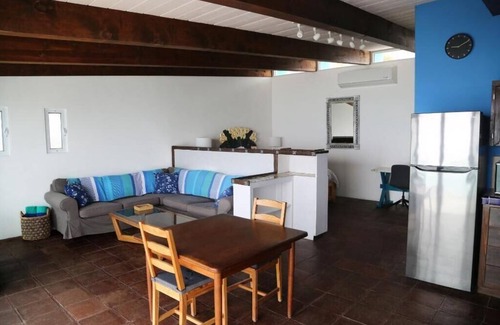 La Fonda Condo | Private beach apartment with balcony and direct access to sandy beach!