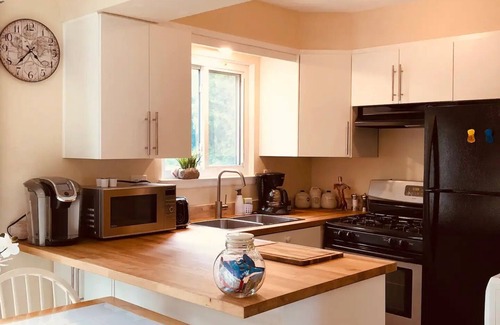 Mitchell House | Private home with fenced yard, confortable with a deck in backyardn