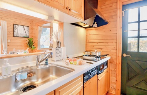 Sano Cottage | Private log house in Sano City with wood stove hammock board games and projector screen/Sano Tochigi