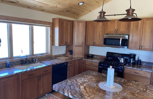 Cameron House | Private setting an hour from Yellowstone Park and minutes from fishing accesses.
