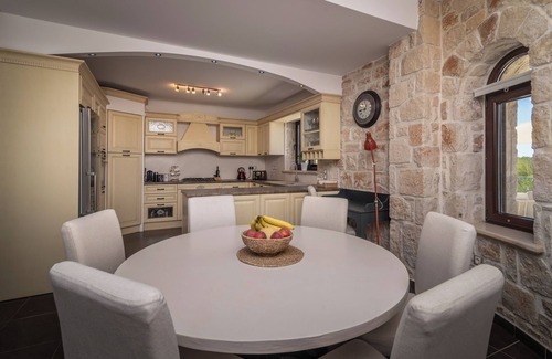 Agia Marina Villa | Private stone villa with heated pool & large outside area, set alone on hillside