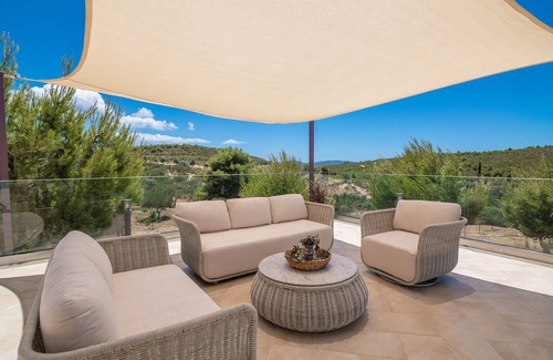 Agia Marina Villa | Private stone villa with heated pool & large outside area, set alone on hillside