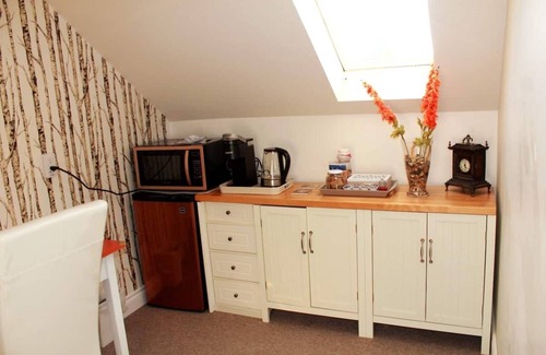 Maple Creek House | Private top floor of house.