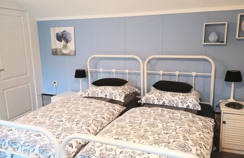 Sint Pancras Bed & Breakfast | Prive tuinhuis B&B Elly